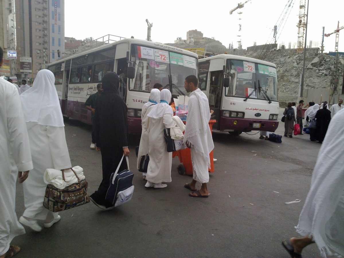 Traveller preparing documents before an Umrah journey