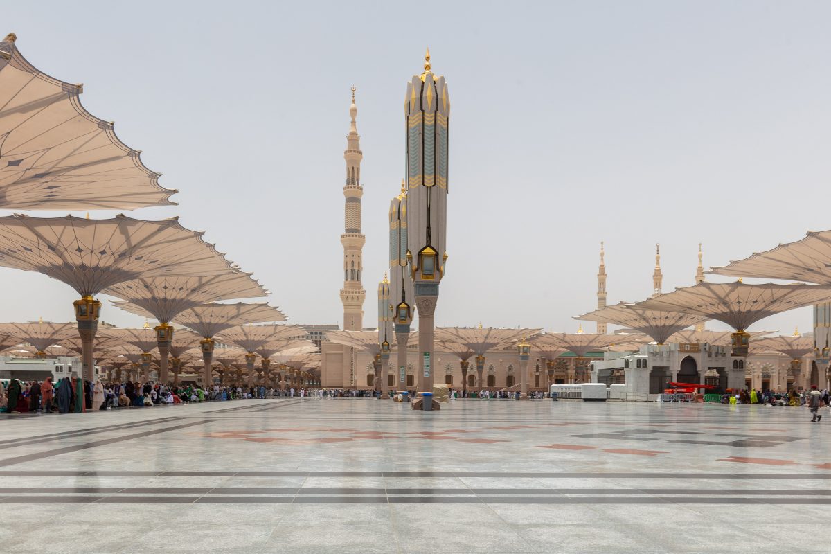 Minarets and shade umbrellas in the courtyard of Masjid an-Nabawi